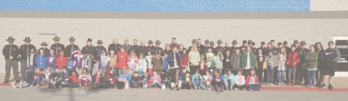 Photo of group from the annual Shop with a Cop event.